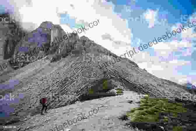 A Lone Hiker Traverses A Narrow Mountain Ridge, Surrounded By Towering Peaks And Vast Wilderness Courage In The Mountain Wilderness (Call Of The Rockies 4)