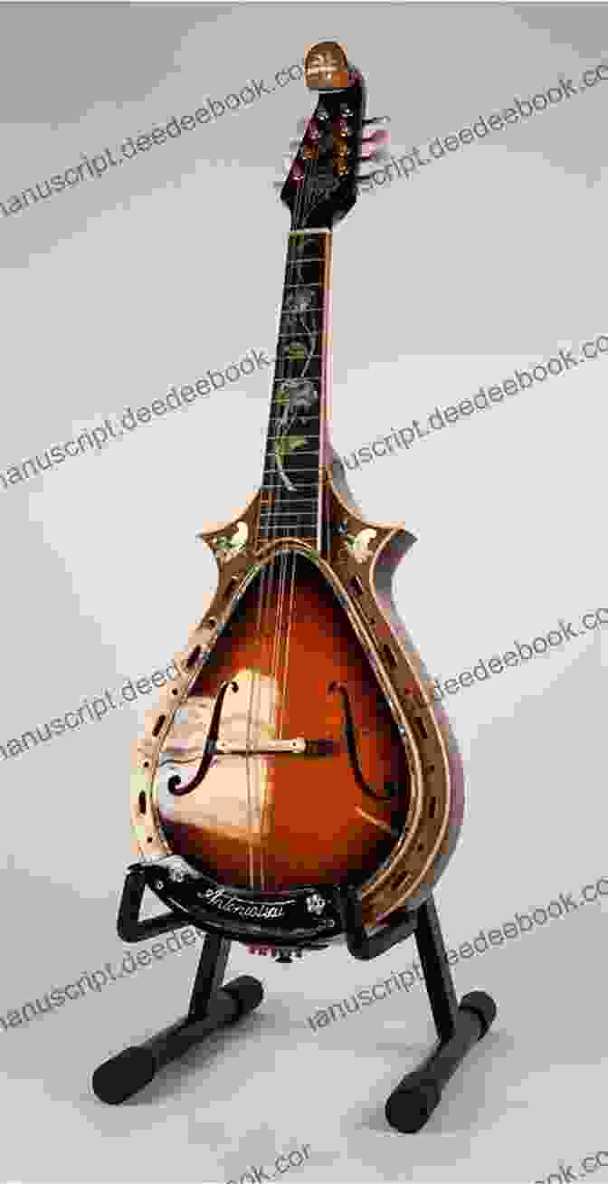 A Mandolin With Eight Strings Arranged In Four Pairs And A Pear Shaped Body Pop Standards Strum Together: Ukulele Baritone Ukulele Guitar Mandolin Banjo