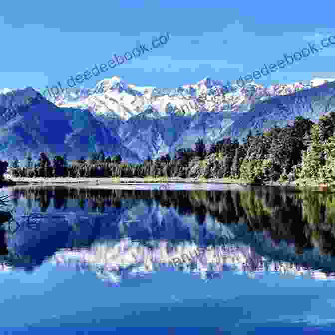 A Panoramic View Of Snow Capped Mountains In Norway, With A Clear Blue Sky And A Sparkling Lake In The Foreground Best Photos From Norway Michael Powell