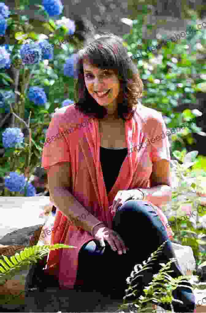 A Photograph Of Natasha Trethewey, A Black Woman With Short Hair And A Serious Expression, Looking Directly At The Camera. Undesirable: Race And Remembrance New Selected Poems
