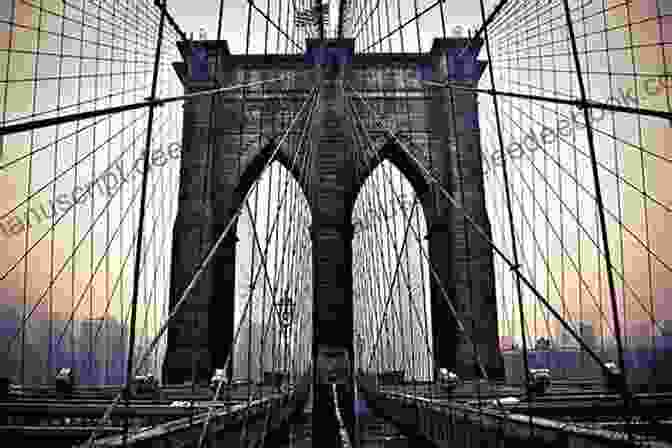 A Stunning View Of The Historic Brooklyn Bridge, Its Suspension Cables Forming Graceful Arcs, Connecting Manhattan And Brooklyn Across The East River. All Inclusive NYC Tourism Guide The New York City Tourists Guide: Tour New York City S Hottest Tours Attractions