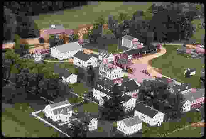 Aerial View Of A Shaker Village With Saltboxes, Stone Walls, And Steeples Amidst A Green, Rolling Landscape. New England Icons: Shaker Villages Saltboxes Stone Walls And Steeples